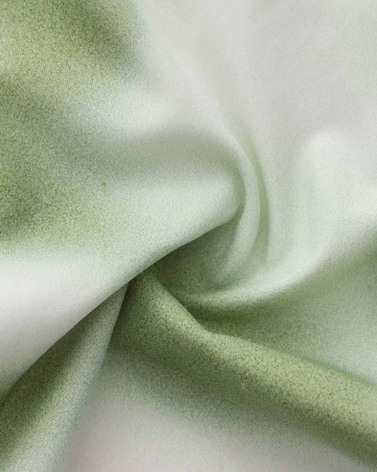 BSZN Dappled Print Swim Brief — Green fabric close-up.