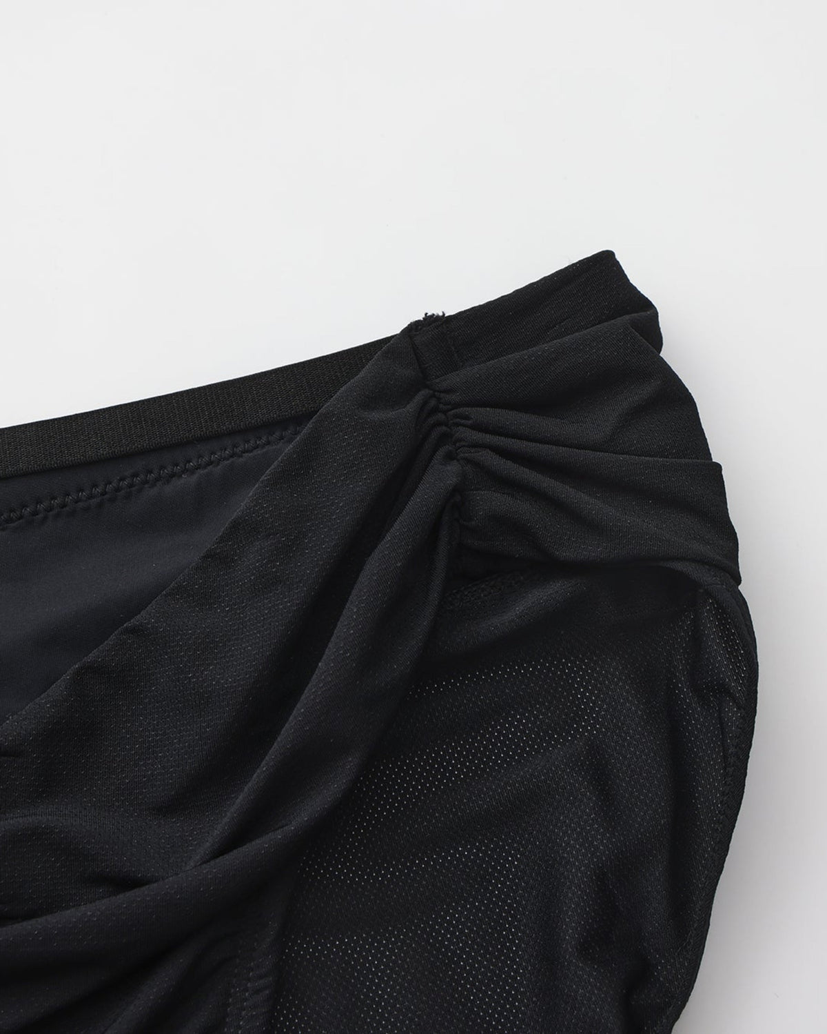 BSZN Shimmer Mesh V-Waist Chain Brief — Black gathered side waist detail.