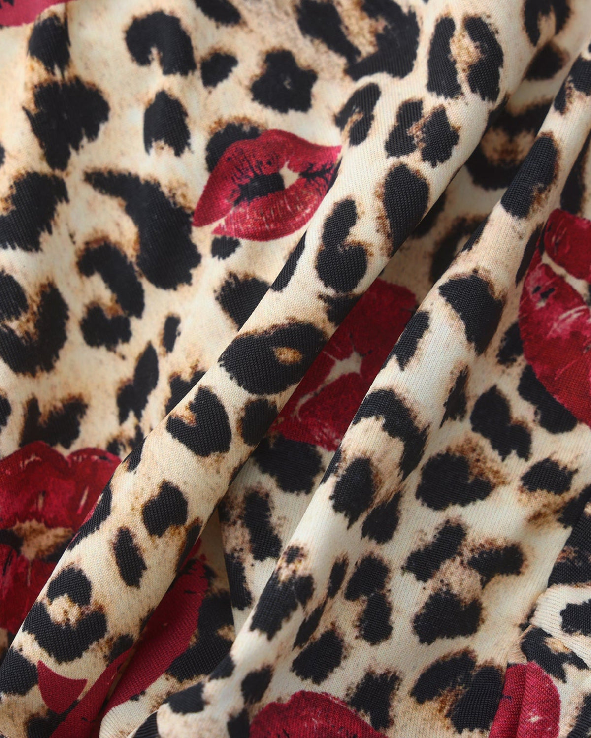 BSZN Wild Kiss Open-Back Trunk — Brown leopard and red lips print close-up.