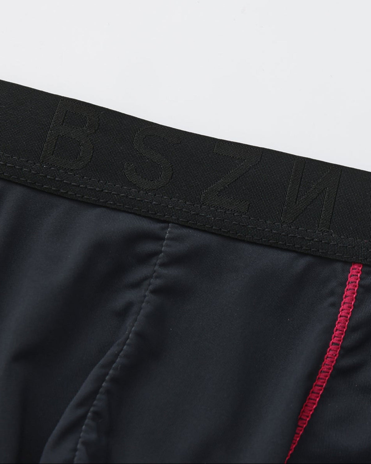 BSZN Tonal BSZN waistband and center seam, close-up.