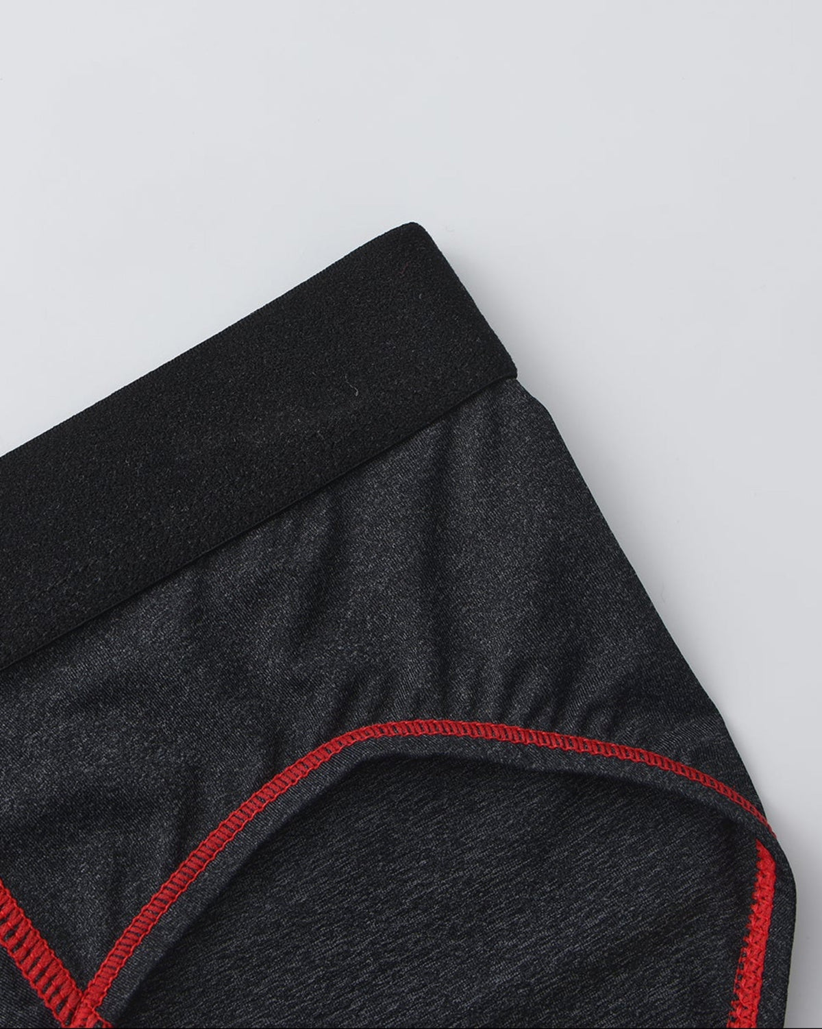BSZN Spiderweb Heart Cutout Brief — Red leg-opening stitching detail.