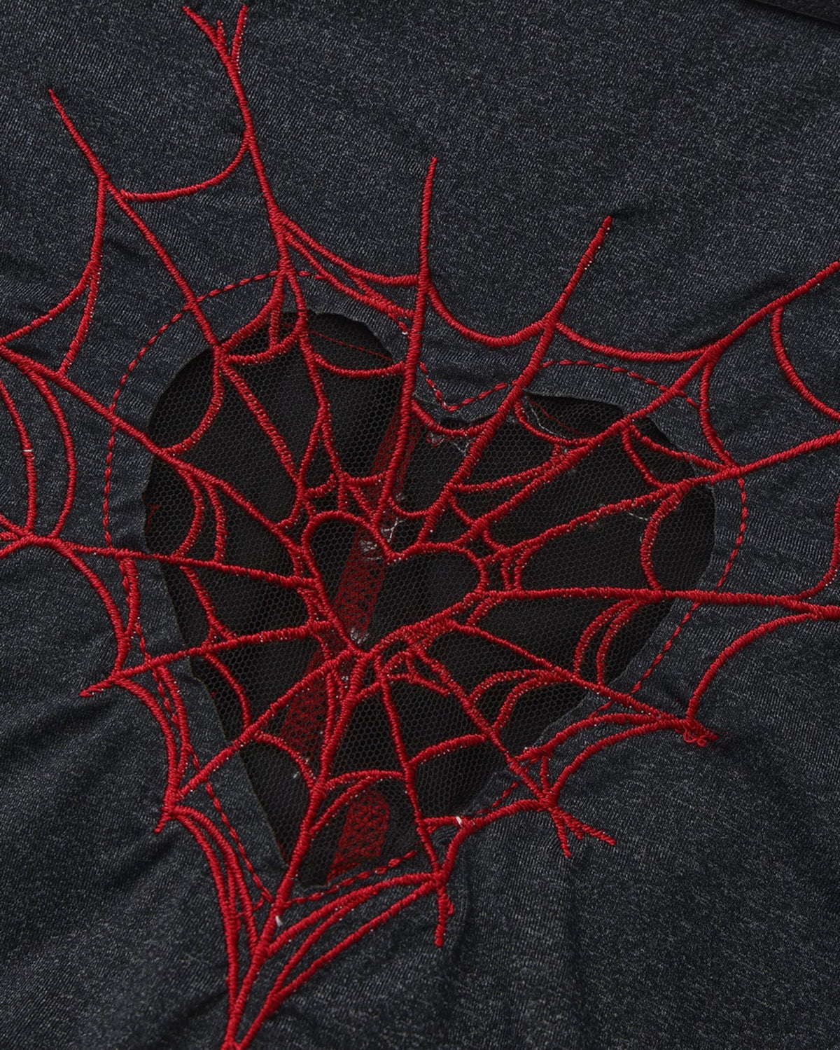 BSZN Spiderweb Heart Cutout Brief — Red spiderweb heart cutout close-up.