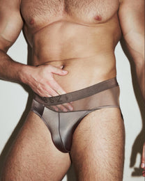 BSZN Midnight Shimmer Mesh-Panel Brief — Brown pouch and waistband on model.