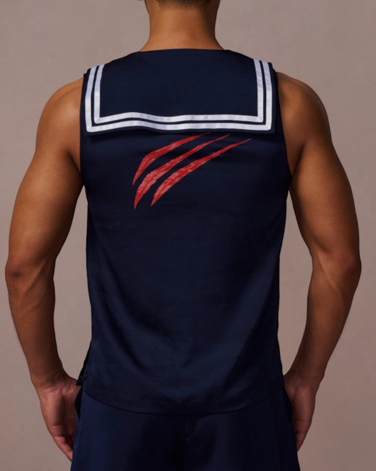 Model wearing the BSZN claw-mark sailor tank top, back view