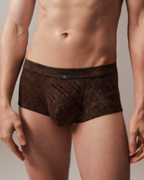 Model wearing the mottled brown BSZN Eternal Trace Slash-Cut Trunk, front view