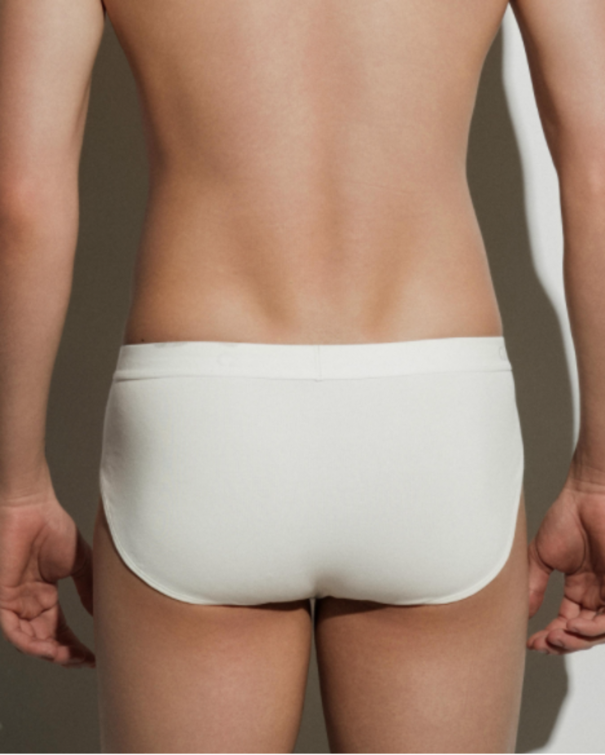 BSZN Thorn Print High-Cut Brief, in white on model, rear view