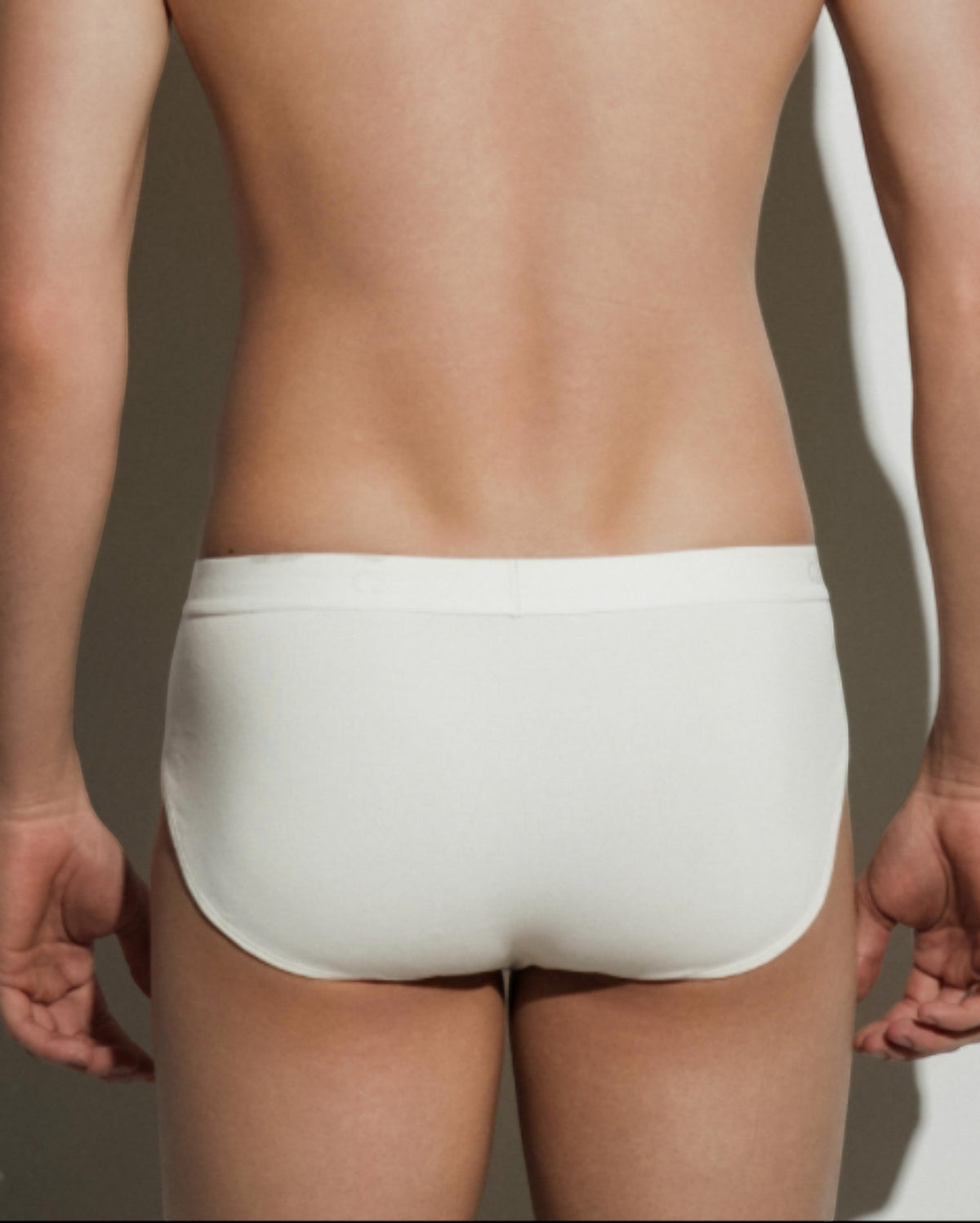 BSZN Thorn Print High-Cut Brief, in white on model, rear view