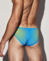 BSZN Gradient Dot Brief — Blue rear three-quarter on model.