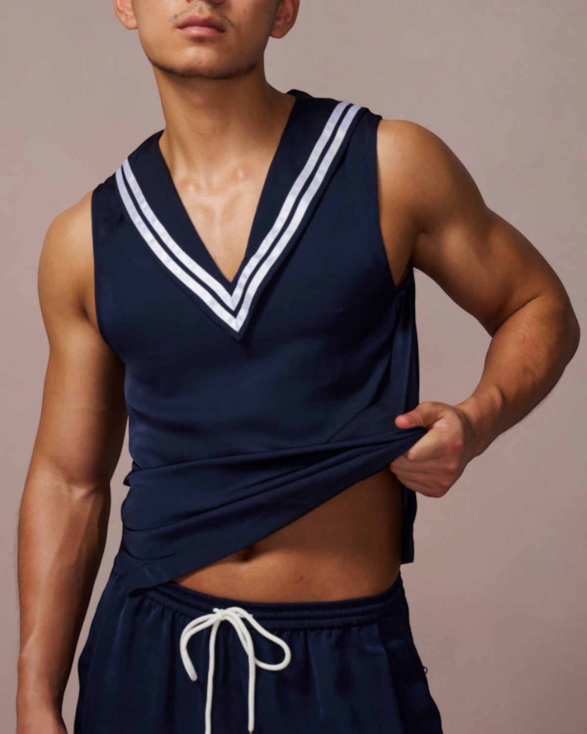 Model wearing the navy BSZN sailor tank top, front view