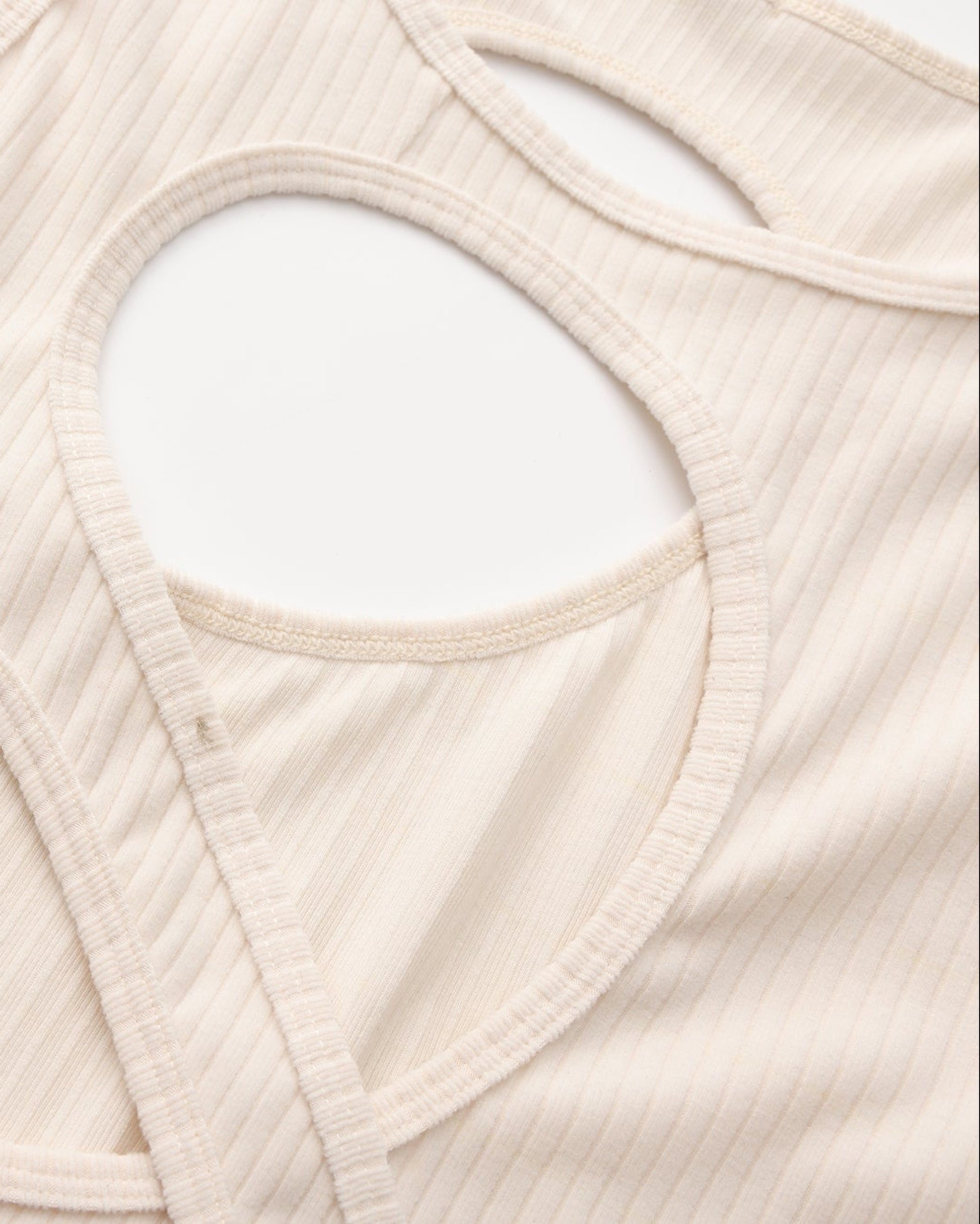 BSZN Asymmetric Cutout Ribbed Tank Top, bound oval cutout and diagonal-band construction detail