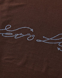 BSZN Crystal Sheer Tank Top — Rhinestone lettering close-up.