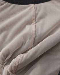 BSZN Metallic Pouch Logo Thong — Interior pouch seam detail.