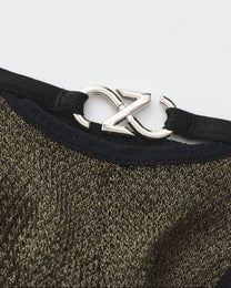 BSZN Metallic Pouch Logo Thong — Green metal logo detail.