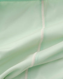 Close-up of the green brief's inner seam construction