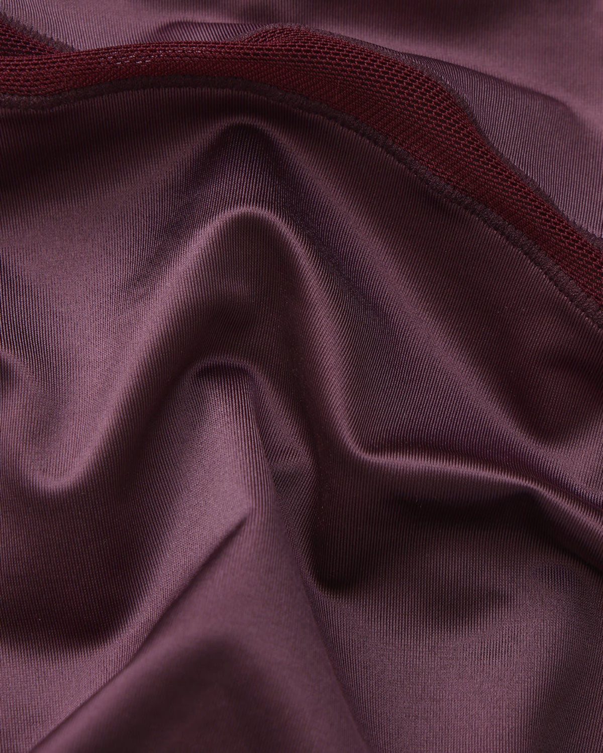 BSZN Midnight Shimmer Mesh-Panel Brief — Purple satin-look fabric close-up.