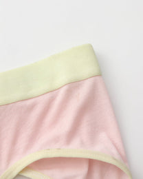 Close-up of the pink body with pale yellow waistband and leg binding