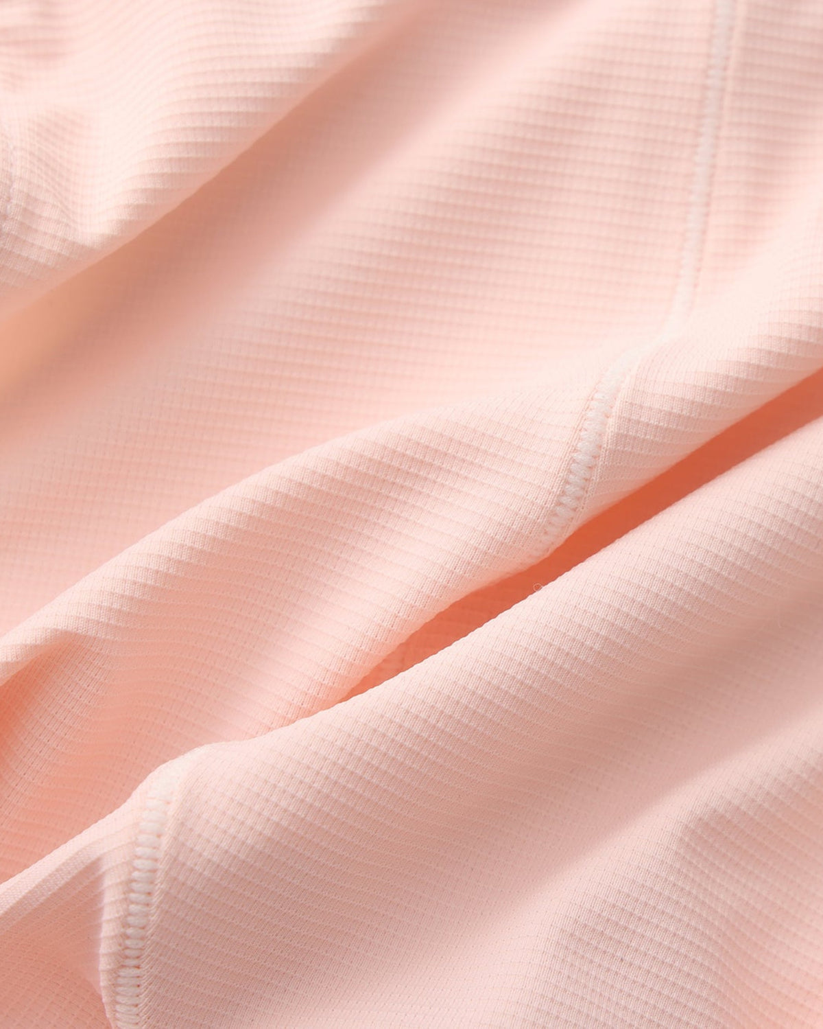 BSZN Wave Palette Double-Strap Jockstrap — Pink fine-textured fabric close-up.