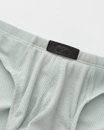 BSZN Crystal Veil V-Sculpt Brief — Pale green front logo detail.