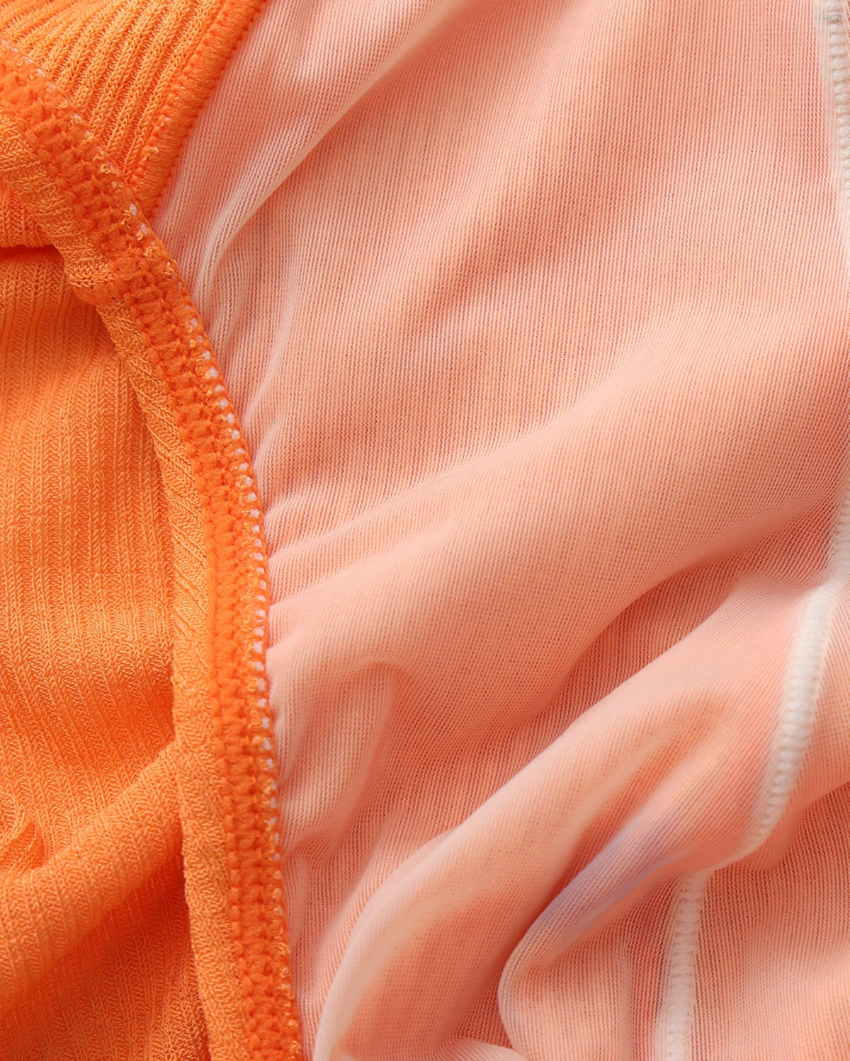 BSZN Crystal Veil V-Sculpt Brief — Orange pouch lining detail.