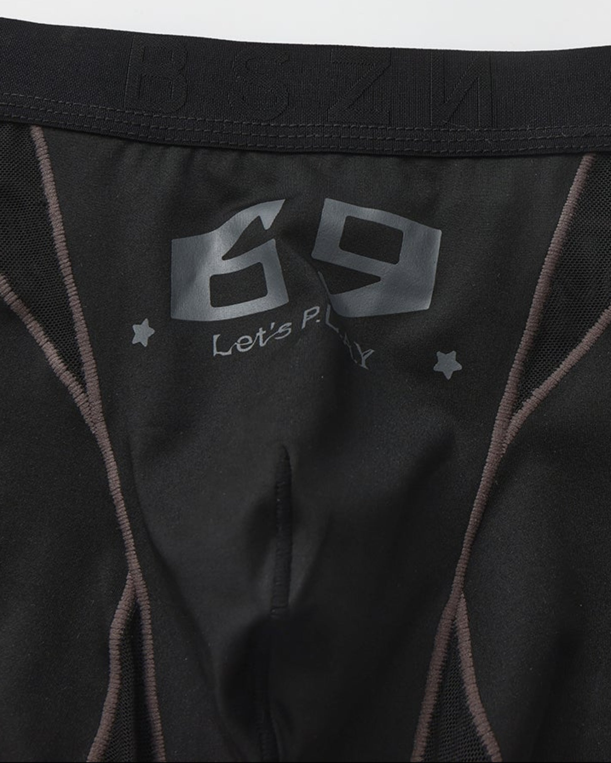 Close-up of the grey 69 graphic and contrast pouch seams