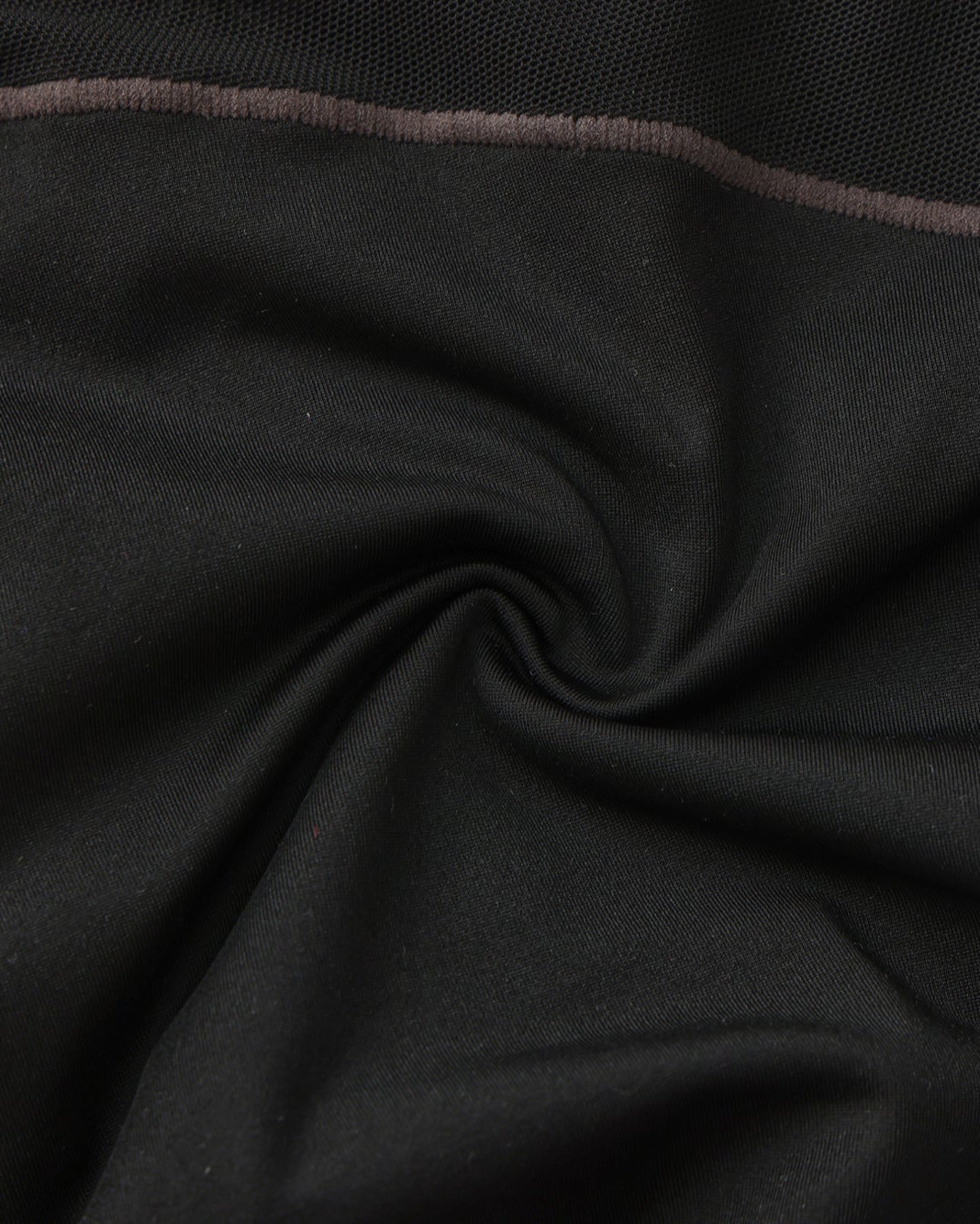 Close-up of smooth black stretch fabric