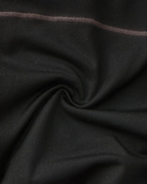 Close-up of the black stretch fabric and grey contrast stitching