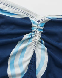 Close-up of the striped ruched tie-back panel