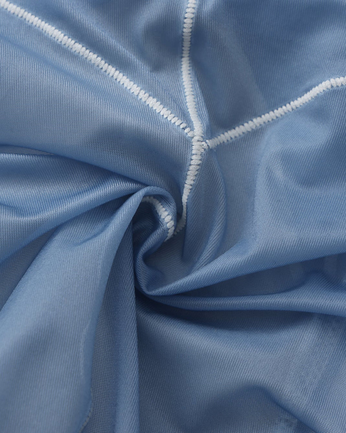 BSZN Sheer Contrast-Seam Brief — Blue sheer fabric close-up.