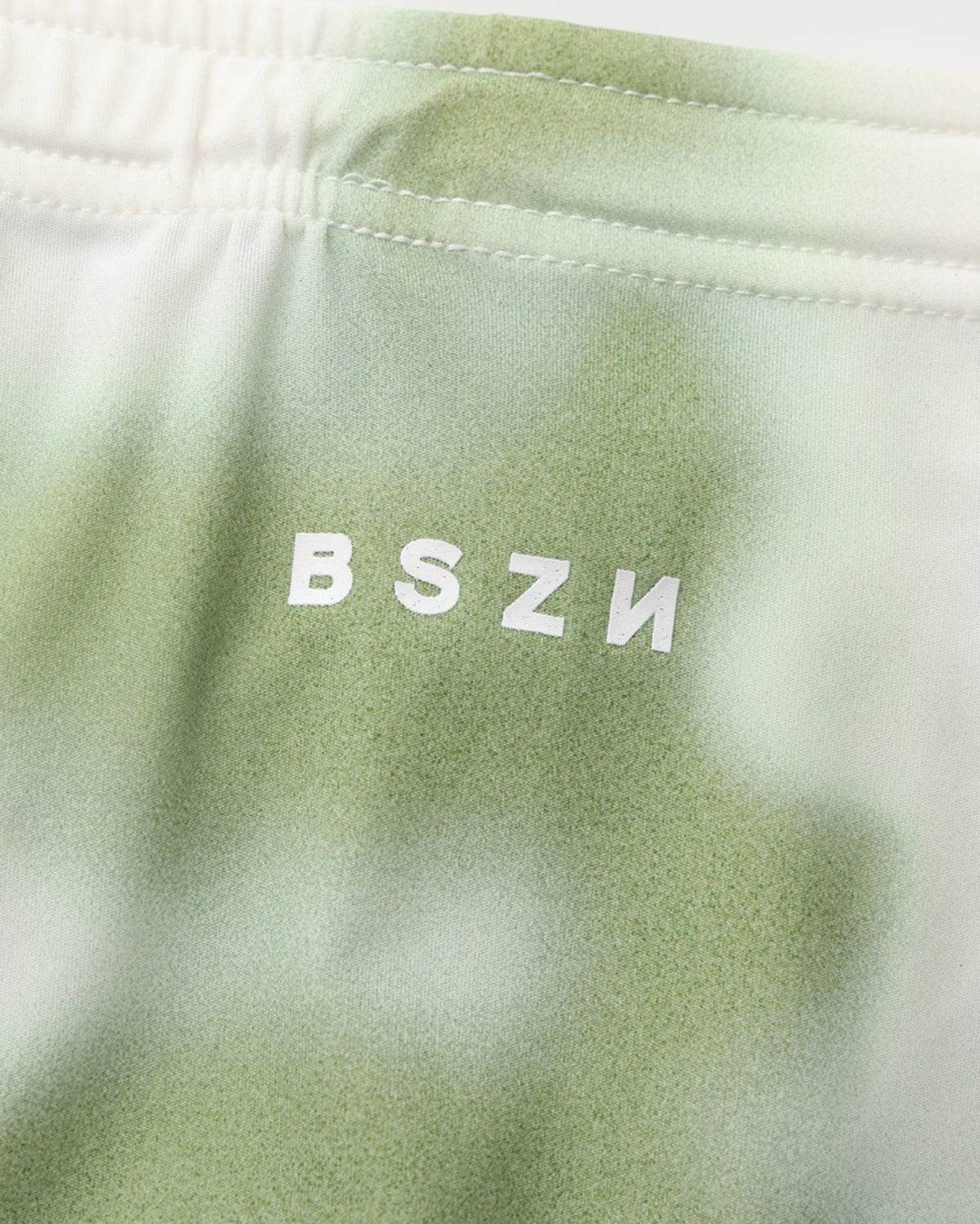 BSZN Dappled Print Swim Brief — Green BSZN rear logo detail.