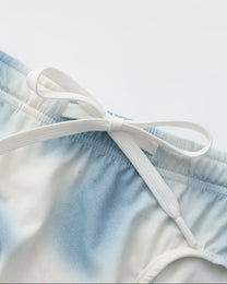 BSZN Dappled Print Swim Brief — Blue drawstring waist detail.
