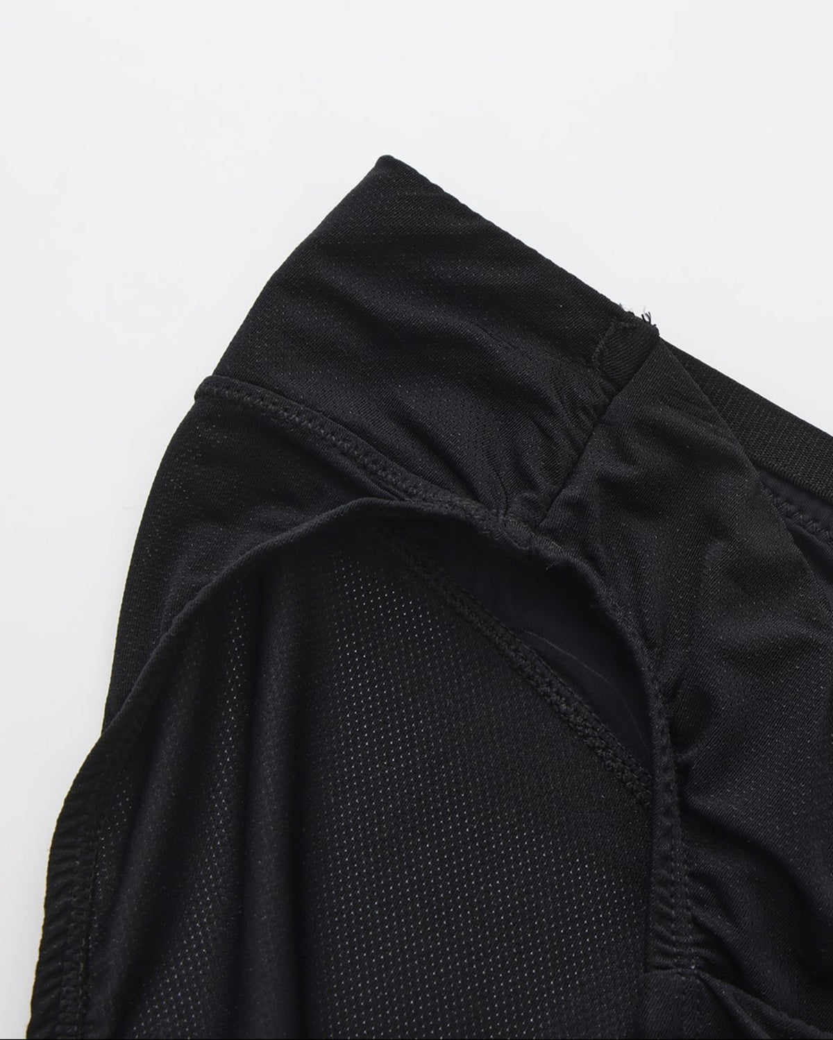 BSZN Shimmer Mesh V-Waist Chain Brief — Black leg opening and mesh detail.