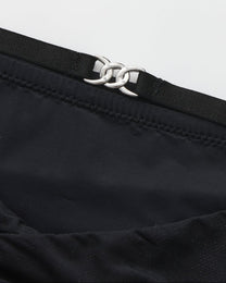BSZN Shimmer Mesh V-Waist Chain Brief — Black metal-link waist detail.