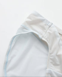 BSZN Shimmer Mesh V-Waist Chain Brief — Pale blue leg opening detail.