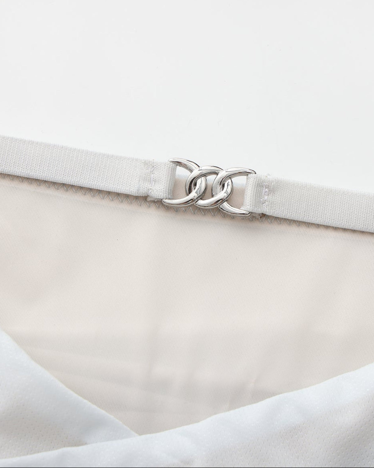 BSZN Shimmer Mesh V-Waist Chain Brief — Pale blue metal-link detail.