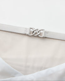 BSZN Shimmer Mesh V-Waist Chain Brief — Pale blue metal-link detail.