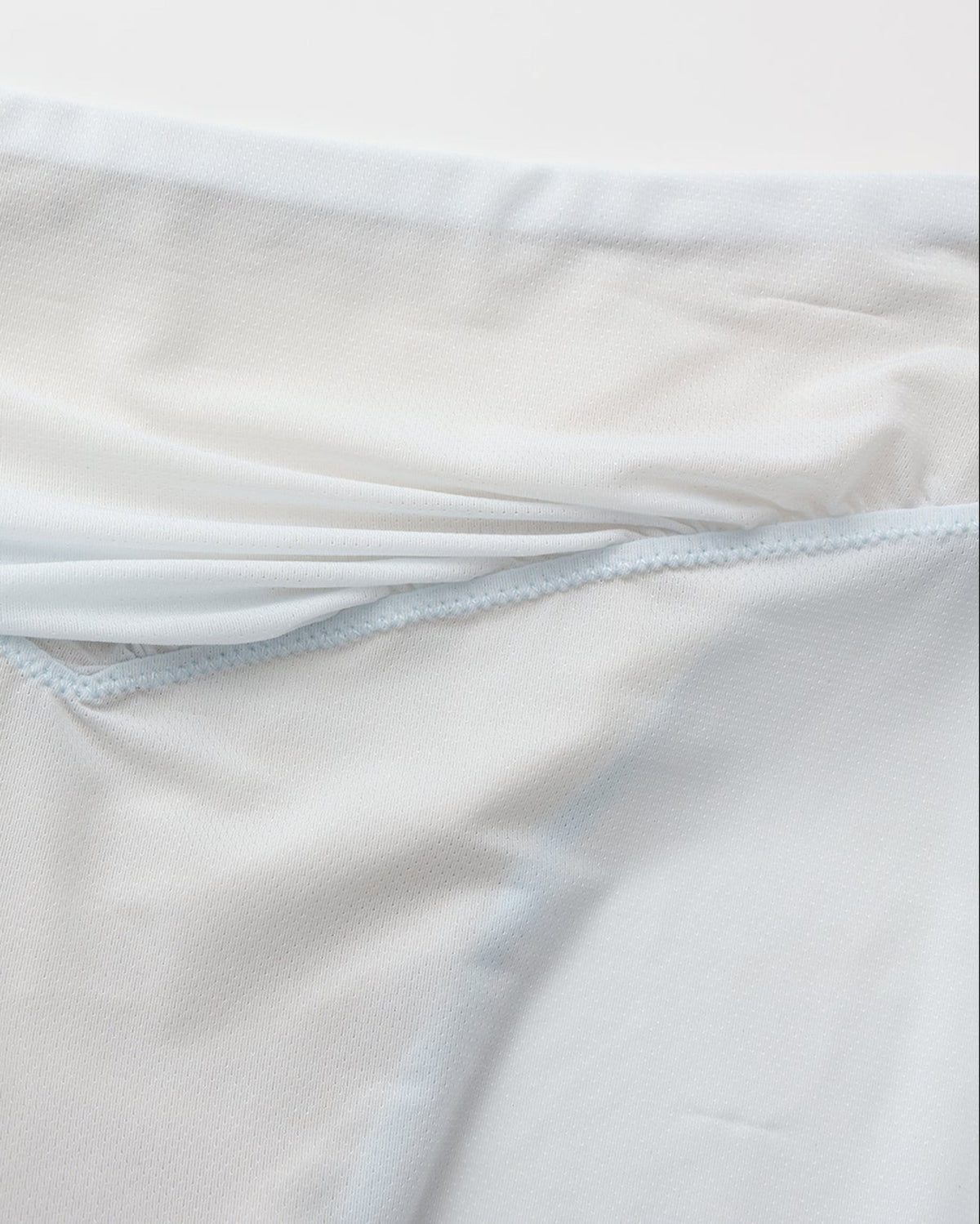 BSZN Shimmer Mesh V-Waist Chain Brief — Pale blue draped waistband detail.