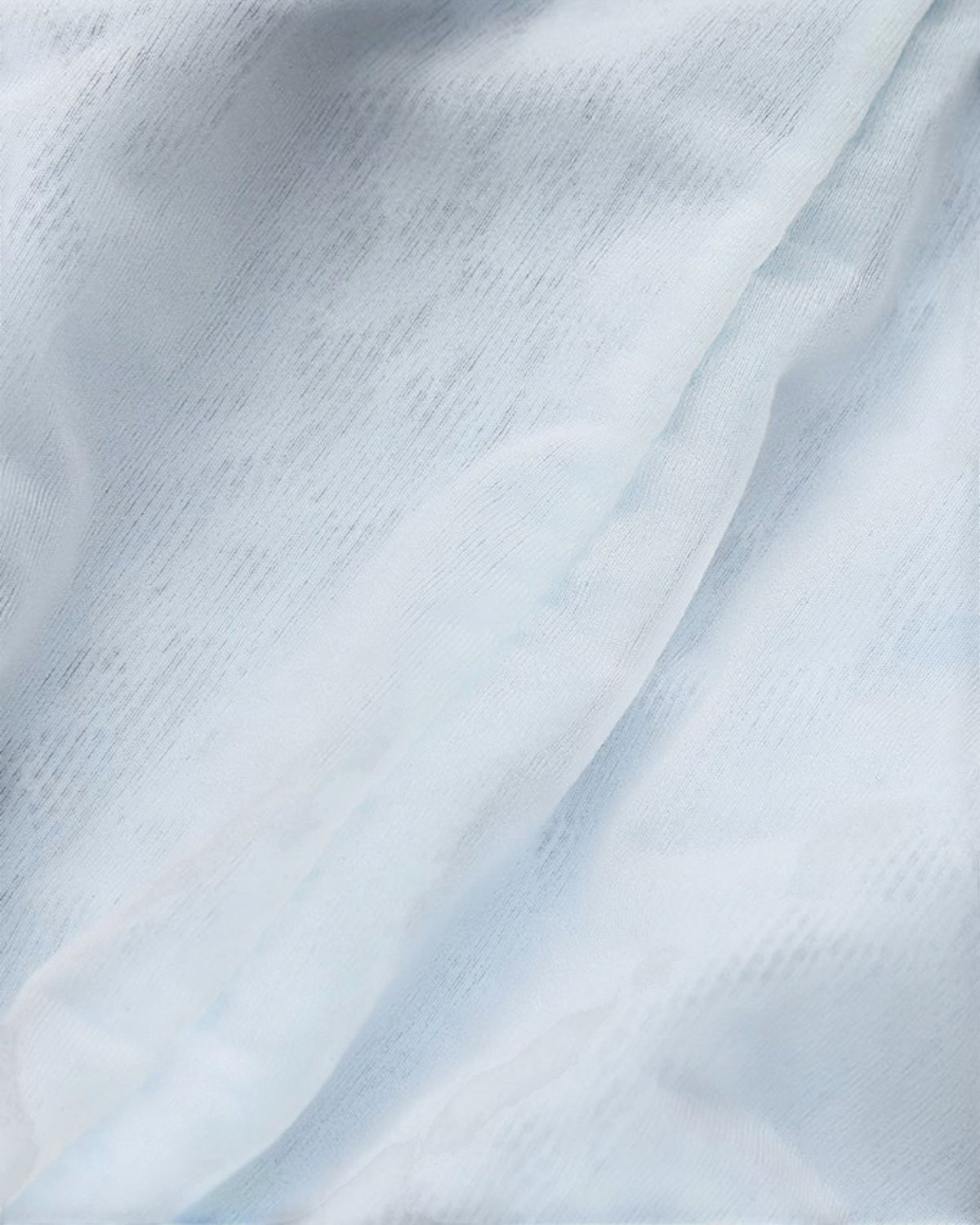 Close-up of the pale blue leopard mesh and opaque pouch-lining edge