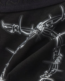 BSZN Thorn Print Thong, black barbed-wire print detail