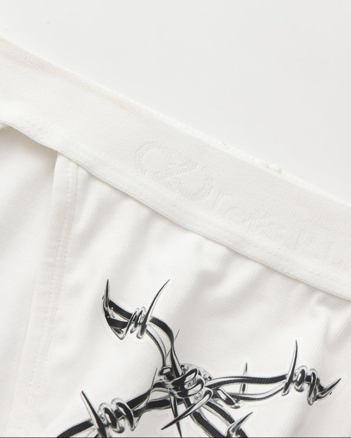 BSZN Thorn Print High-Cut Brief, white logo waistband and print detail