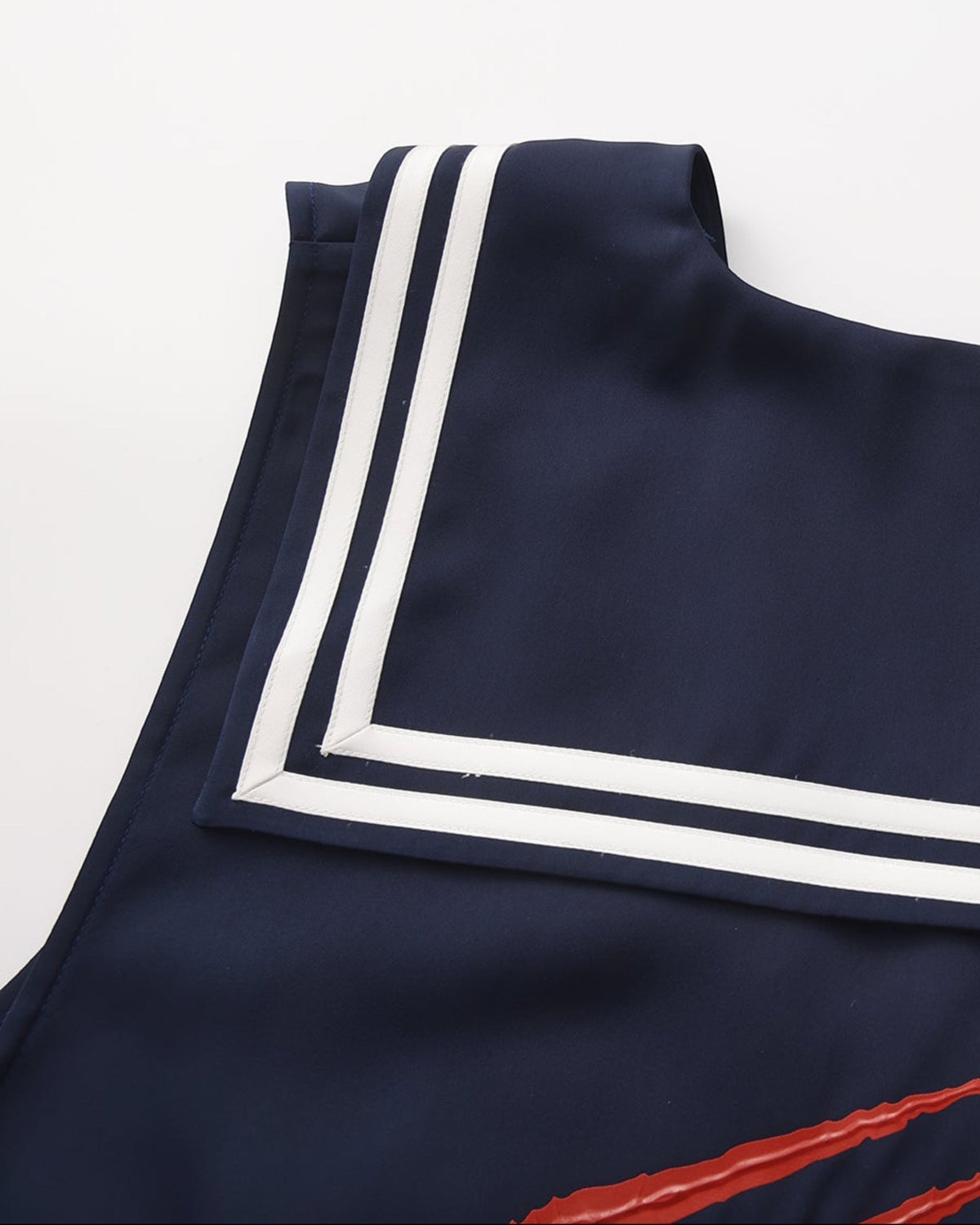Close-up of the square striped sailor collar at the back