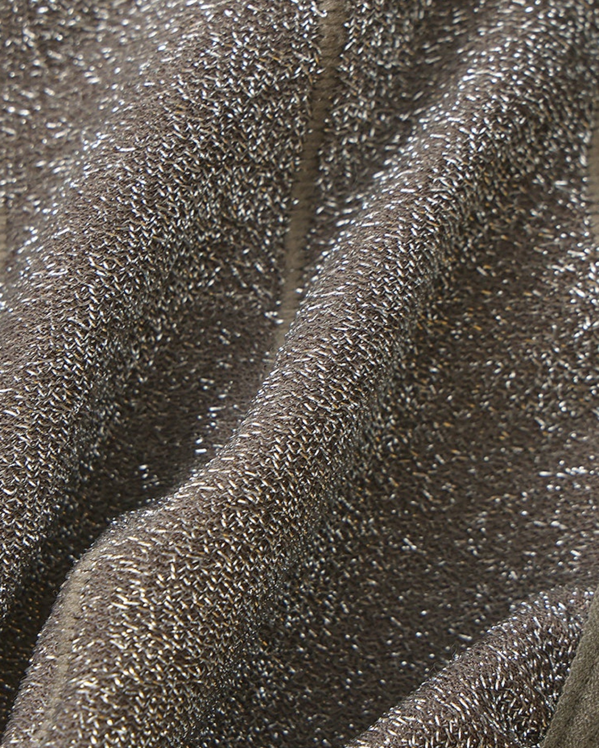 Close-up of the metallic-knit fabric texture