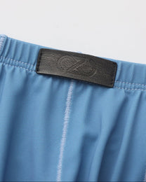 BSZN Sheer V-Waist Ruched-Back Brief, sky blue front logo tab and pouch-seam detail