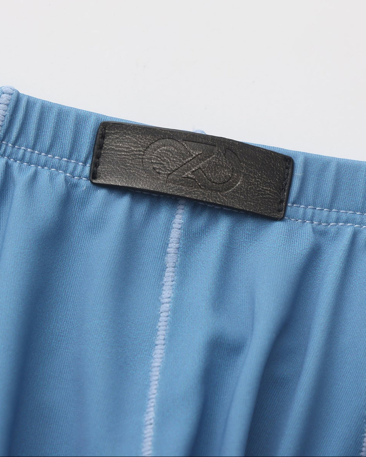 BSZN Sheer V-Waist Ruched-Back Brief, sky blue front logo tab and pouch-seam detail