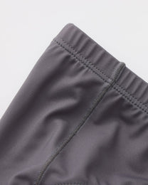 BSZN Sheer V-Waist Ruched-Back Brief, smoke gray bound edge and panel-seam detail