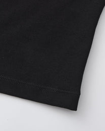 BSZN Black tank hem stitching, close-up.