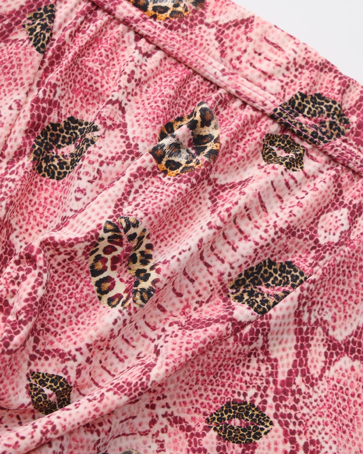 BSZN Wild Kiss Open-Back Trunk — Pink print and front seam detail.