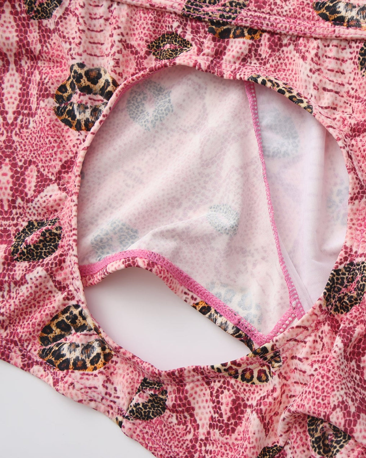 BSZN Wild Kiss Open-Back Trunk — Pink rear cutout edging detail.