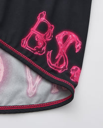 BSZN Printed leg edge and pink stitching, close-up.