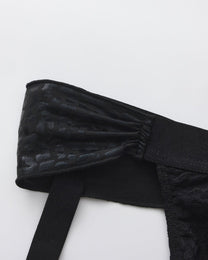 BSZN Glossy scarf fabric and elastic strap junction, close-up.