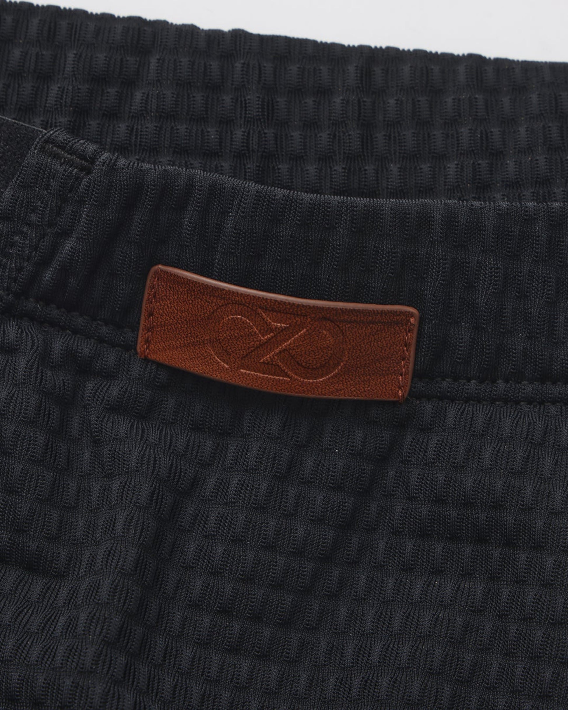 BSZN Net Breaker Cutout Mesh Brief, black dimensional mesh and logo detail